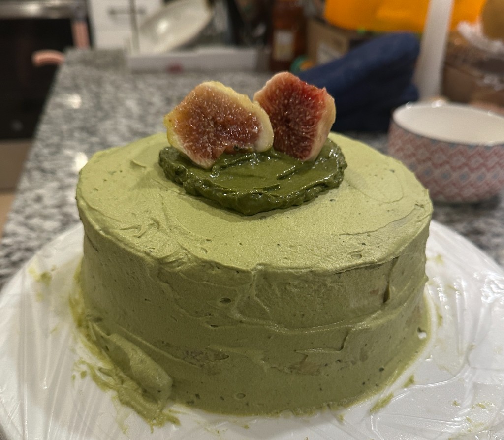 A cake topped with figs