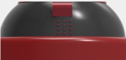Back of the dome with a grid of small speaker holes