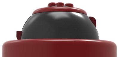 Side view of the bell on its wide red base