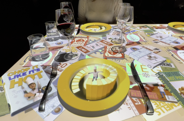 Le Petit Chef projecting an animated chef onto a dinner plate