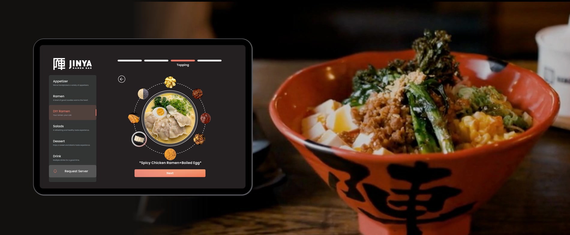 JINYA DIY ramen builder on an iPad beside a bowl of ramen