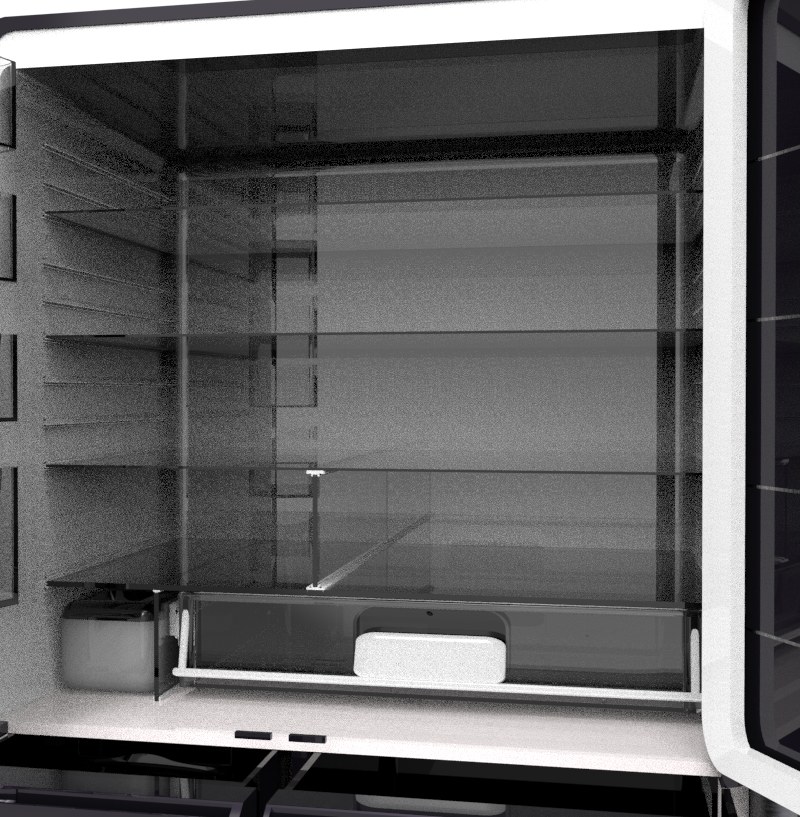 Inside the fridge: glass shelves and a vacuum crisper drawer along the bottom